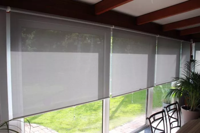 store enrouleur à tirage direct pour baie vitrée