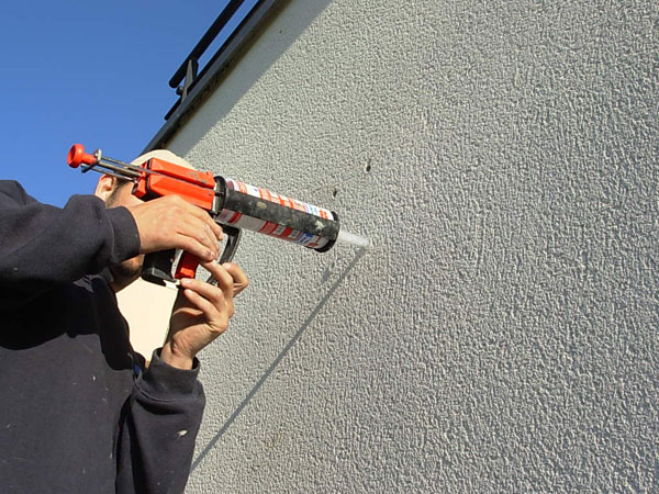 resine chimique pour la pose d'un store banne